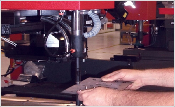 A hydraulic fastener machine frees other equipment for greater productivity